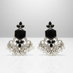 Oxidised silver-tone ethnic earrings with detailed craftsmanship.