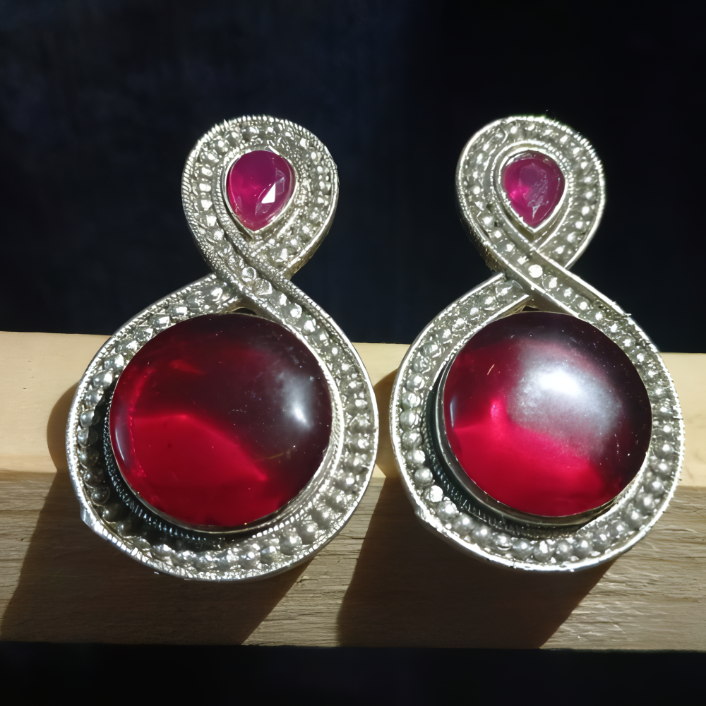 Lovely & elegant silver oxidised red stone earrings for women .