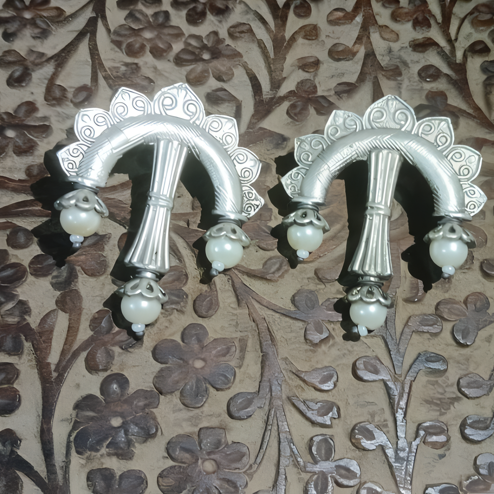 Antique oxidised bow arrow shape stud earrings .