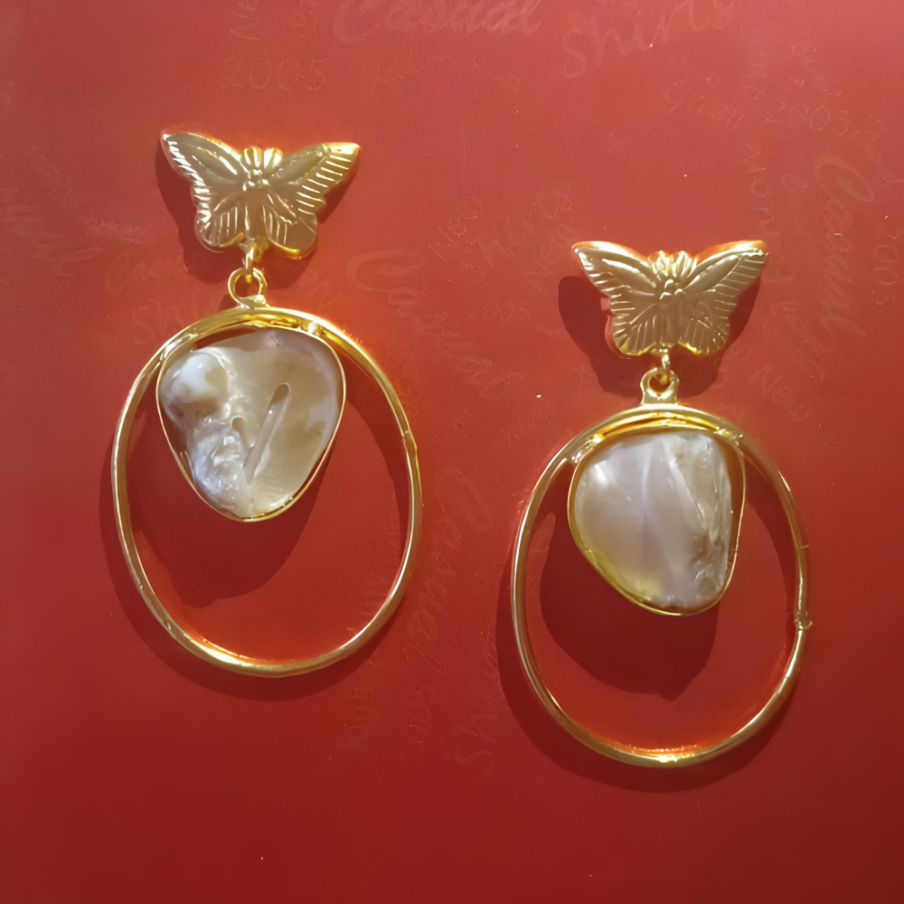 imitation Gold butterfly earrings with uncut heart-shaped stones 