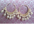 Festive gold hoop earrings with pearls 