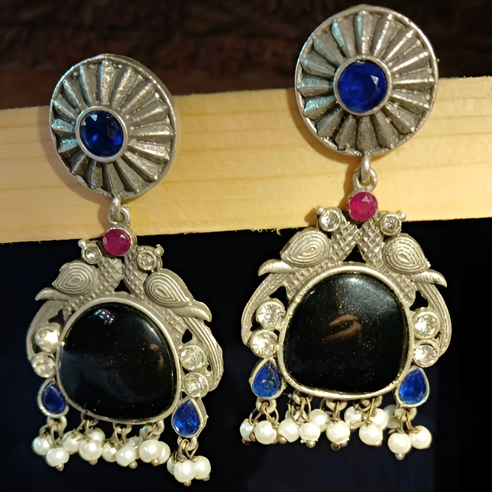 Big traditional black mossianite stone dangle peacock design earrings .