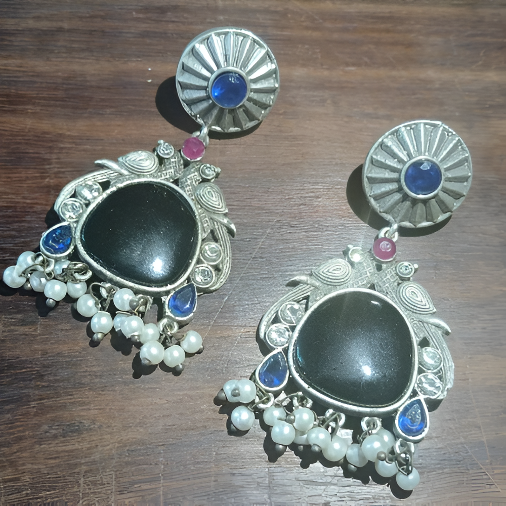 Traditional ethnic black mossianite stone dangle peacock design earrings .