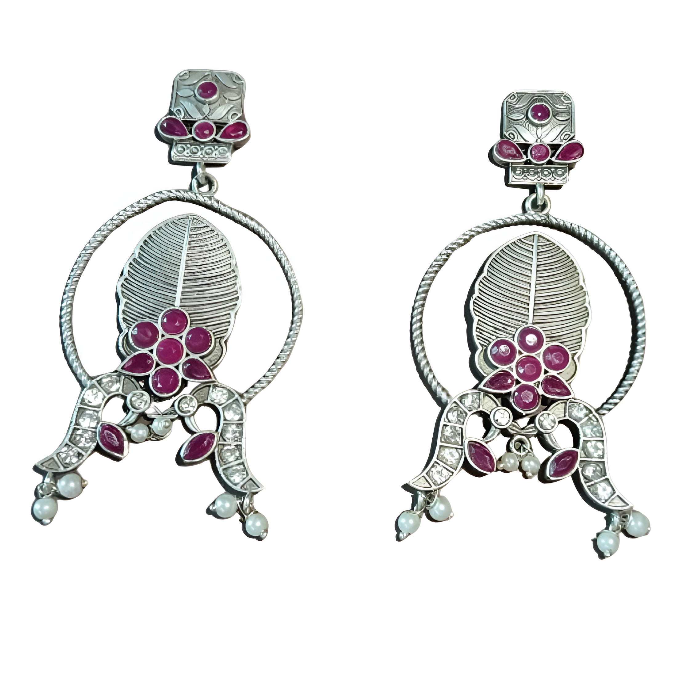 Silver earrings with floral designs and pink kundan stones