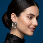 Woman wearing a multicolor peacock stud earrings with intricate detailing.